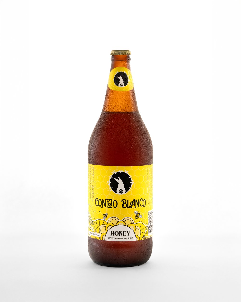 Etiqueta autoadhesiva a color aplicada en cerveza artesanal Conejo Blanco Honey